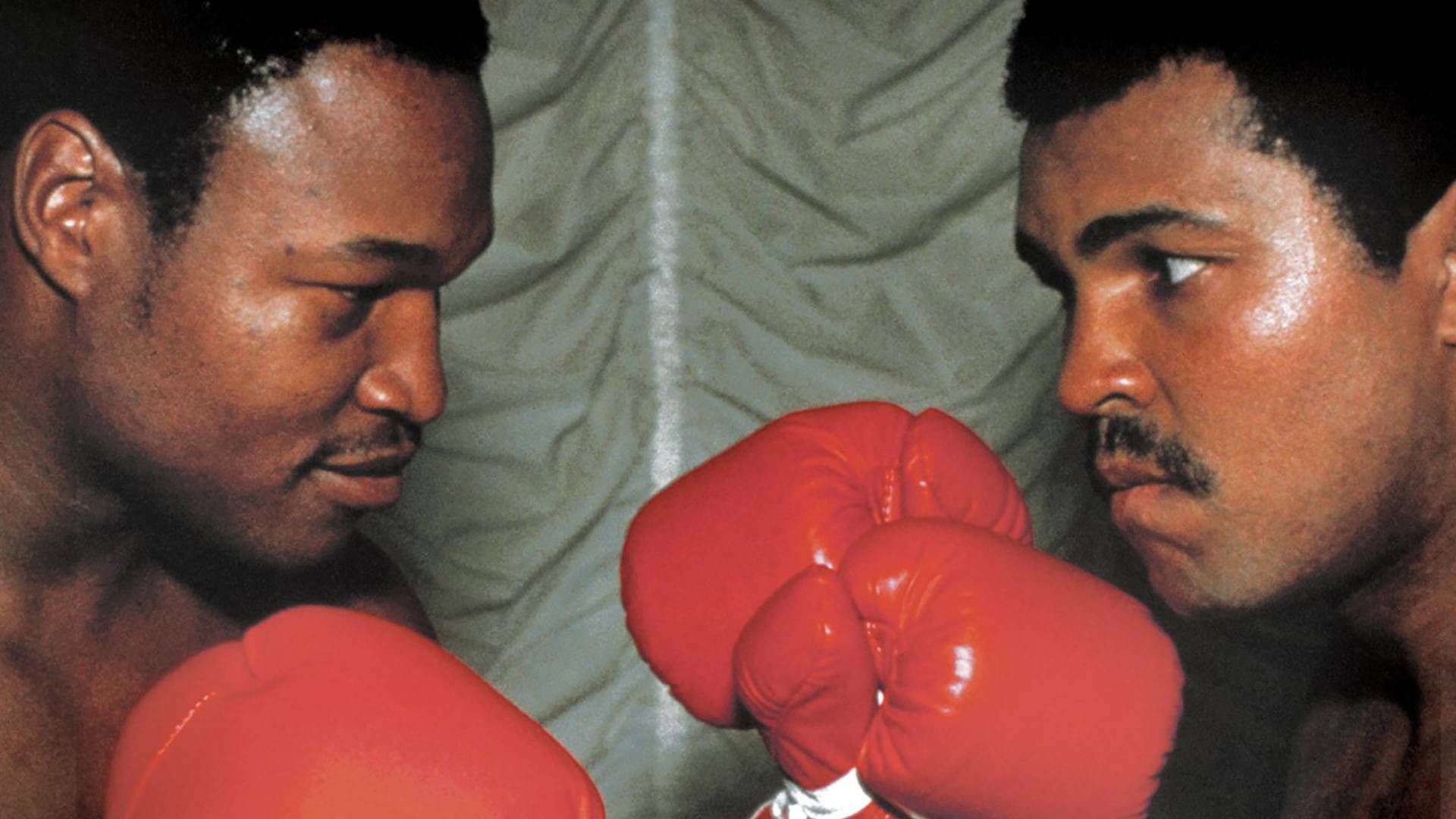 Muhammad Ali y Larry Holmes